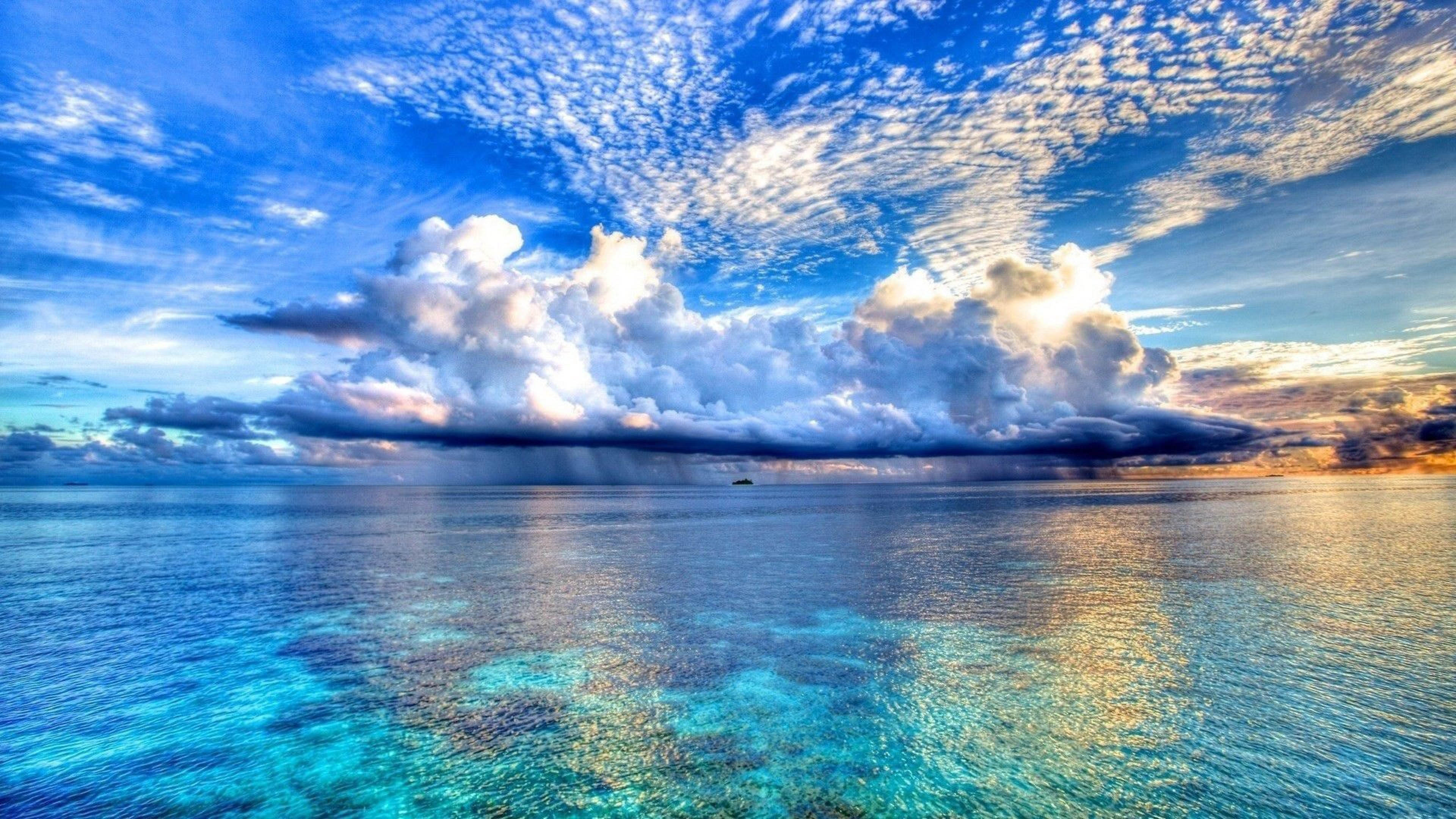 Ocean transparent water blue sky with white clouds computer HD