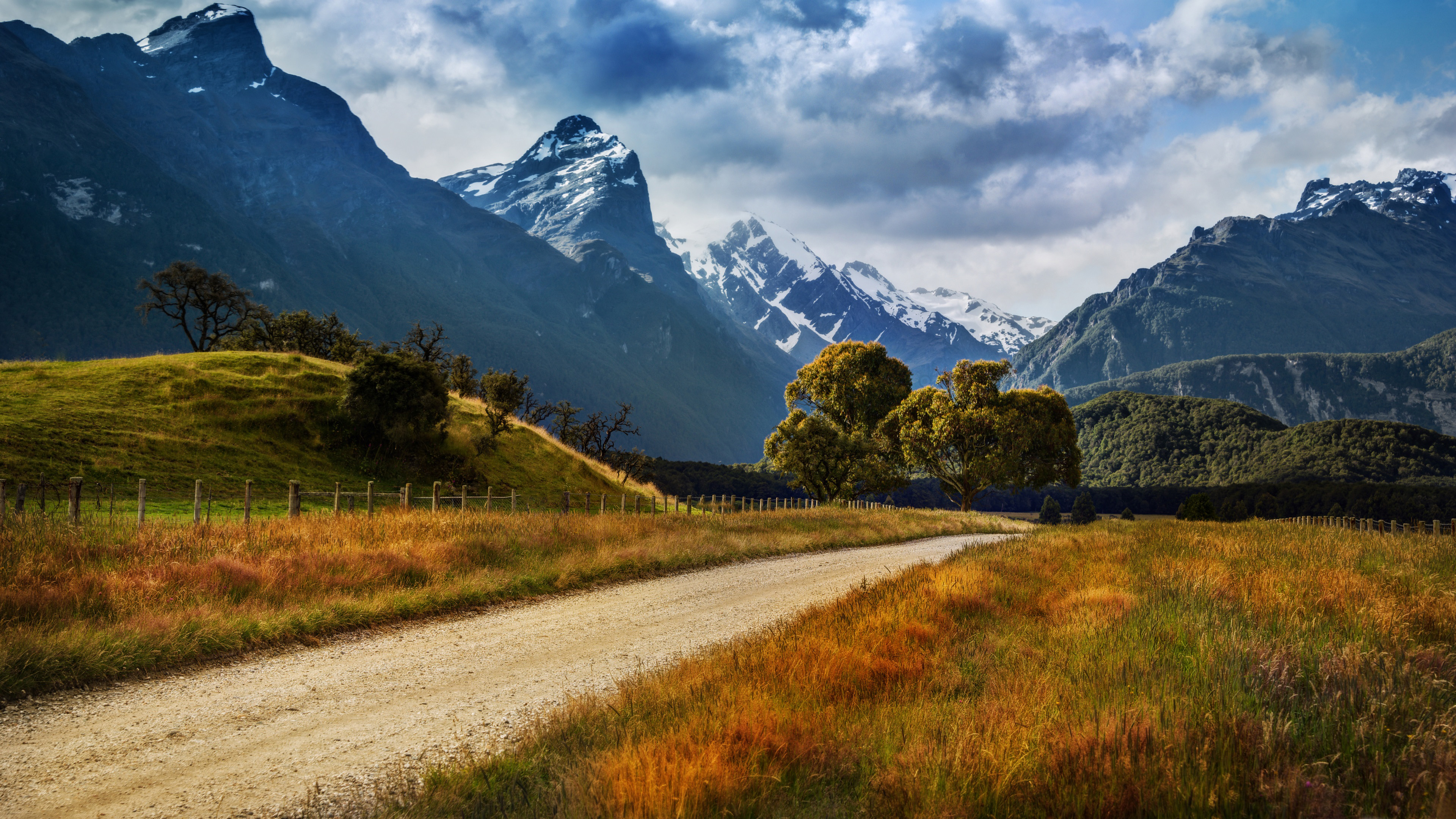 Landscape Of New Zealand Country Road Yellowed Grass, Rocky Peaks Of