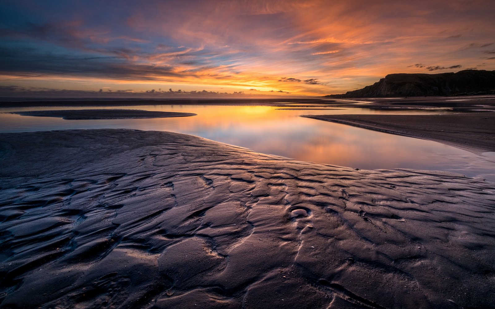 Sunset Red Cloud Wet Ground Mud Reflection In Water 