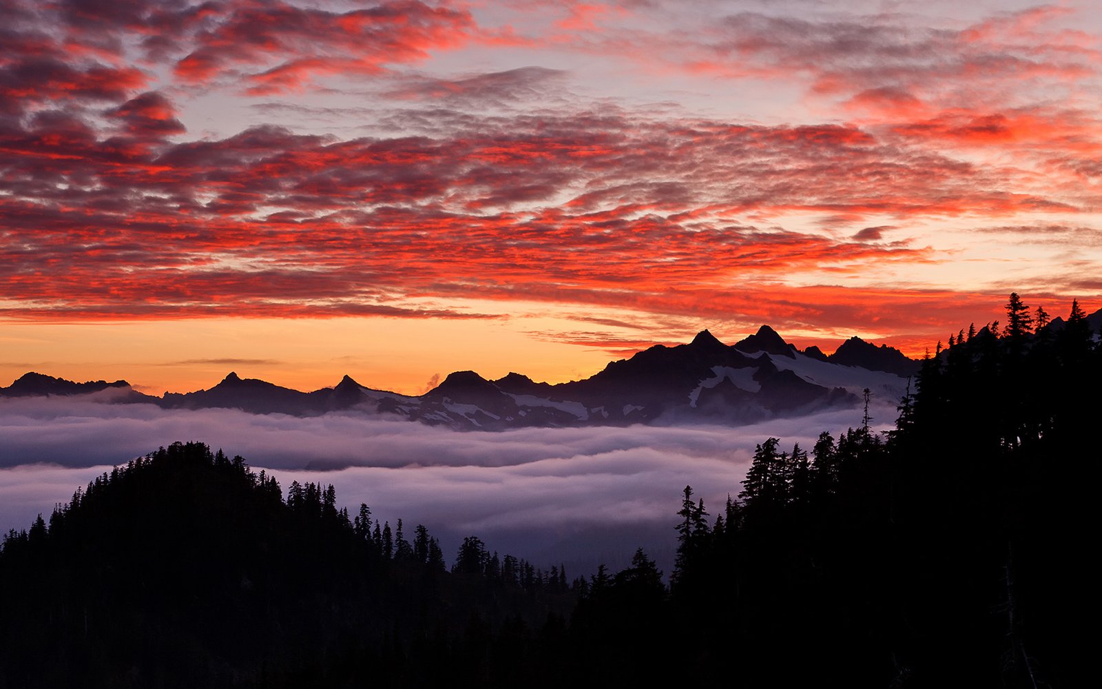 Sky In Oregon Sunset Darkness Red Clouds Mountains Trees Fog Snow