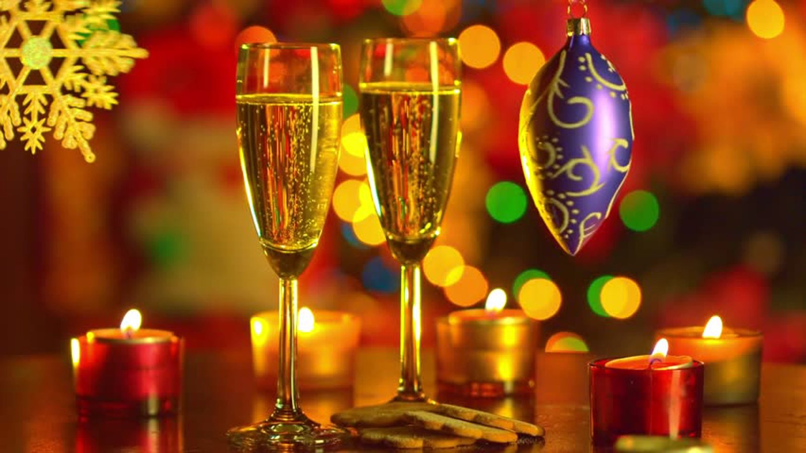 New Year Celebration Two Glass Cups With Champagne Decorations Candles